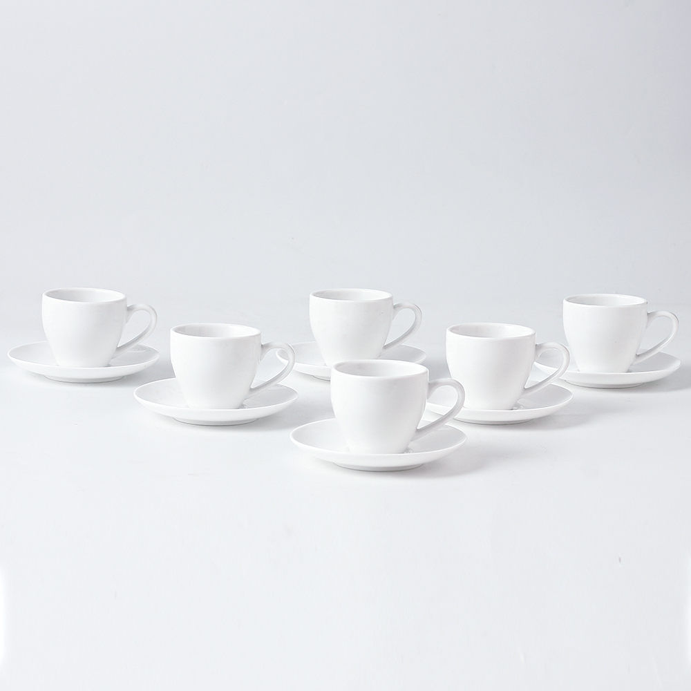 6 Piece Set Of White Ceramic Cups And Dishes